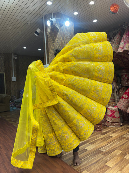 Astonishing yellow haldi mehendi ball bridal Lehenga