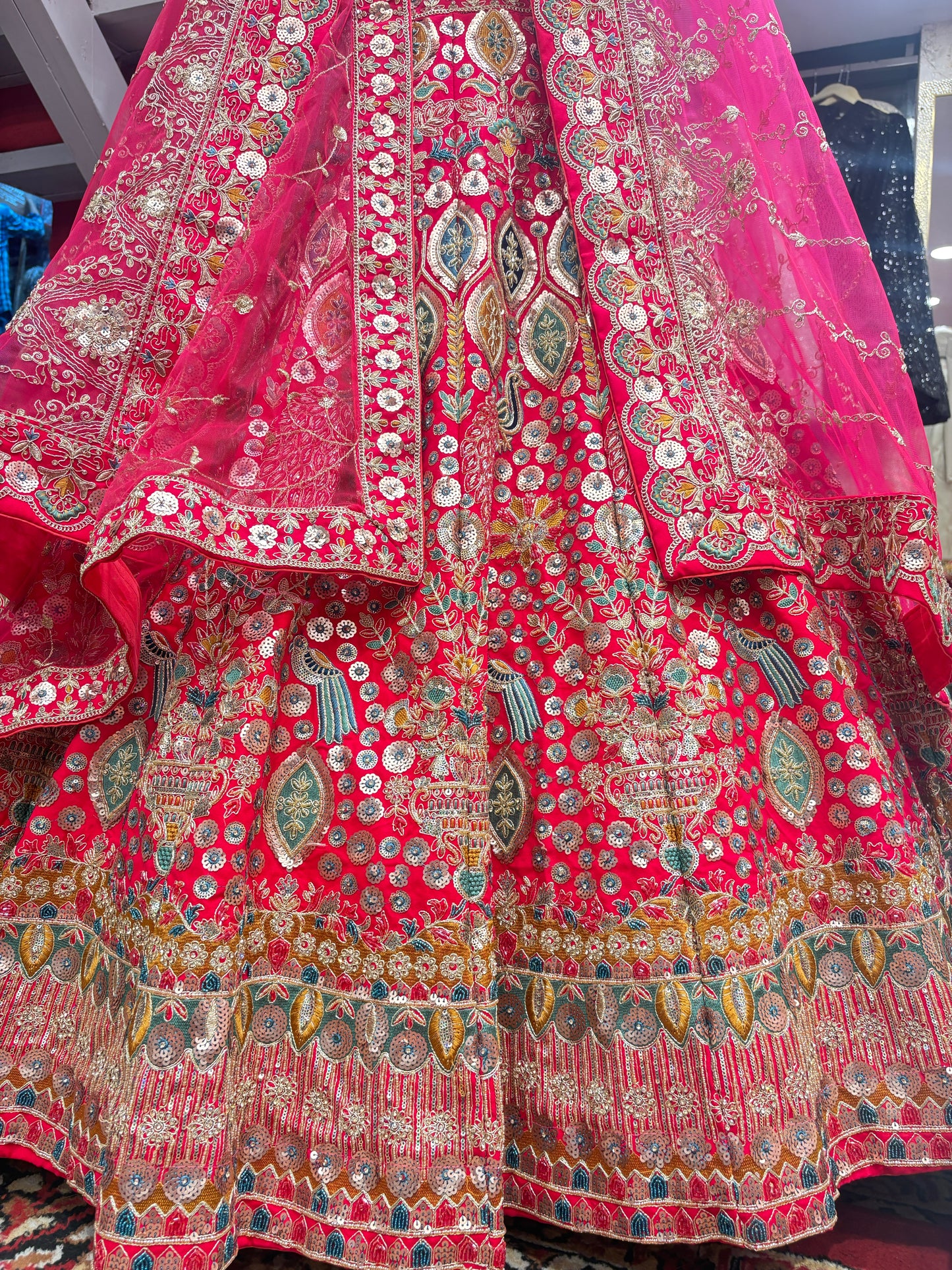 Pretty bridal peacock Lehenga sherwani combo