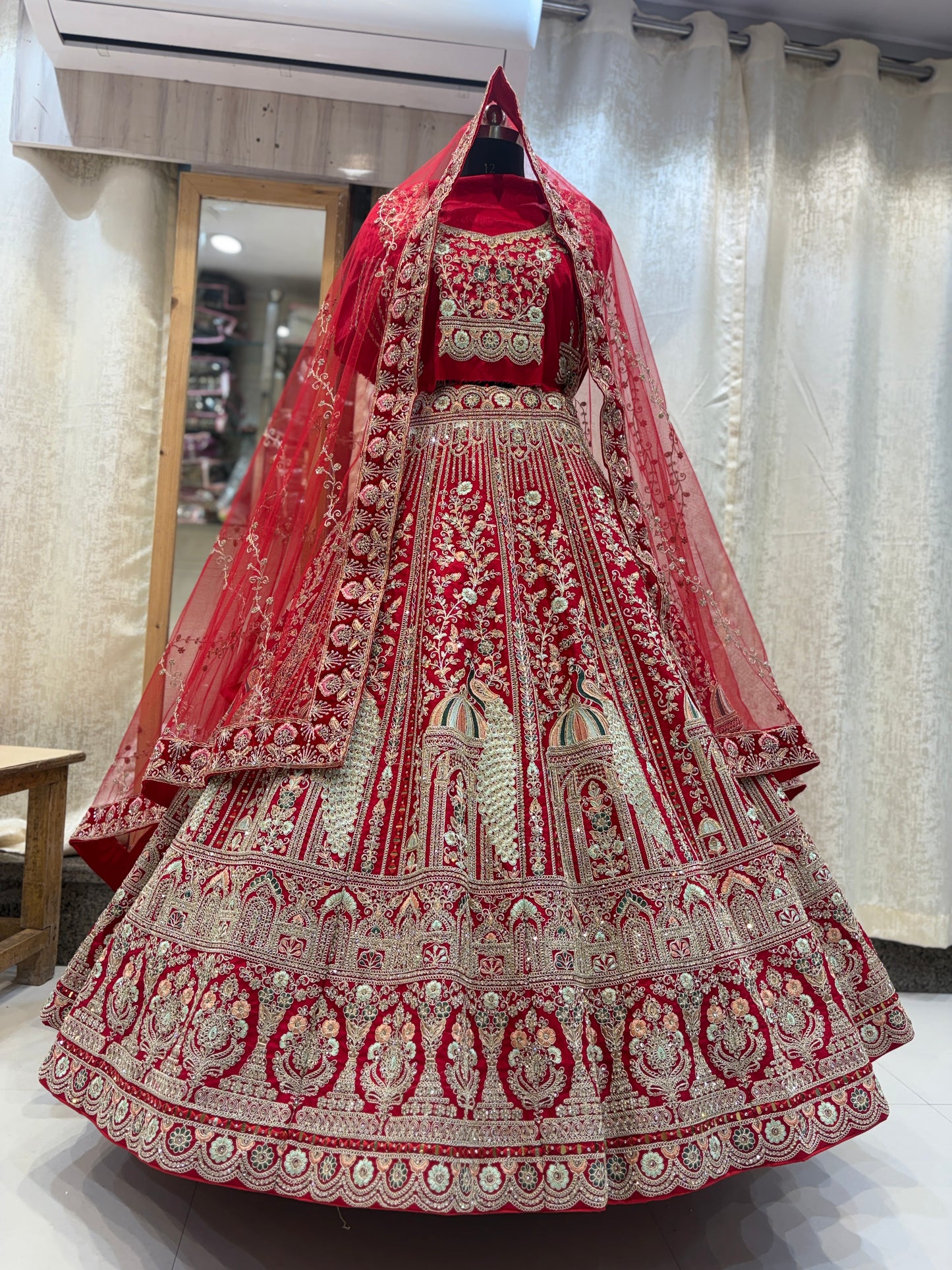 Glamorous maroon peacock bridal Lehenga