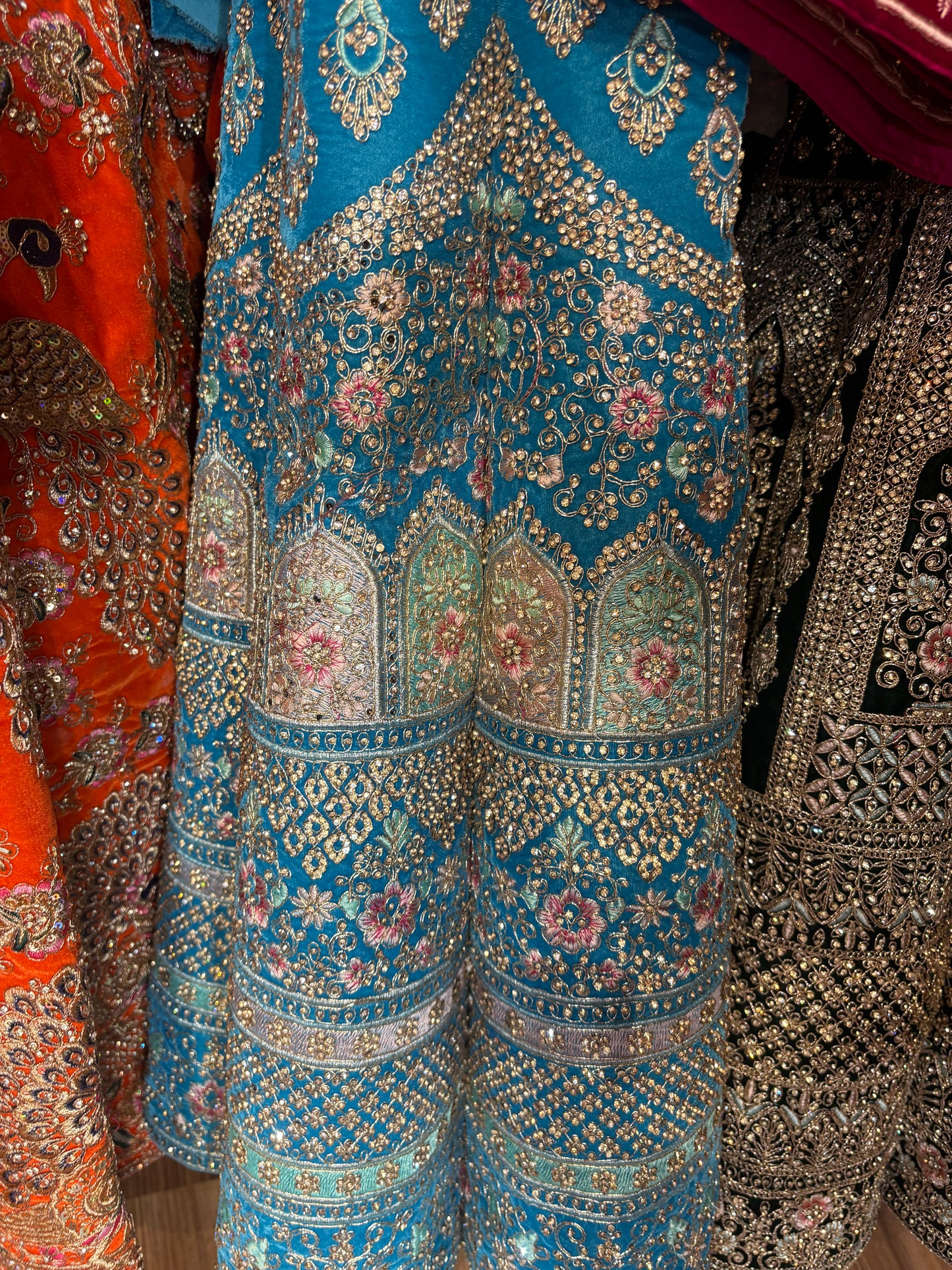 Trendy sky blue Jhumka ball bridal  Lehenga