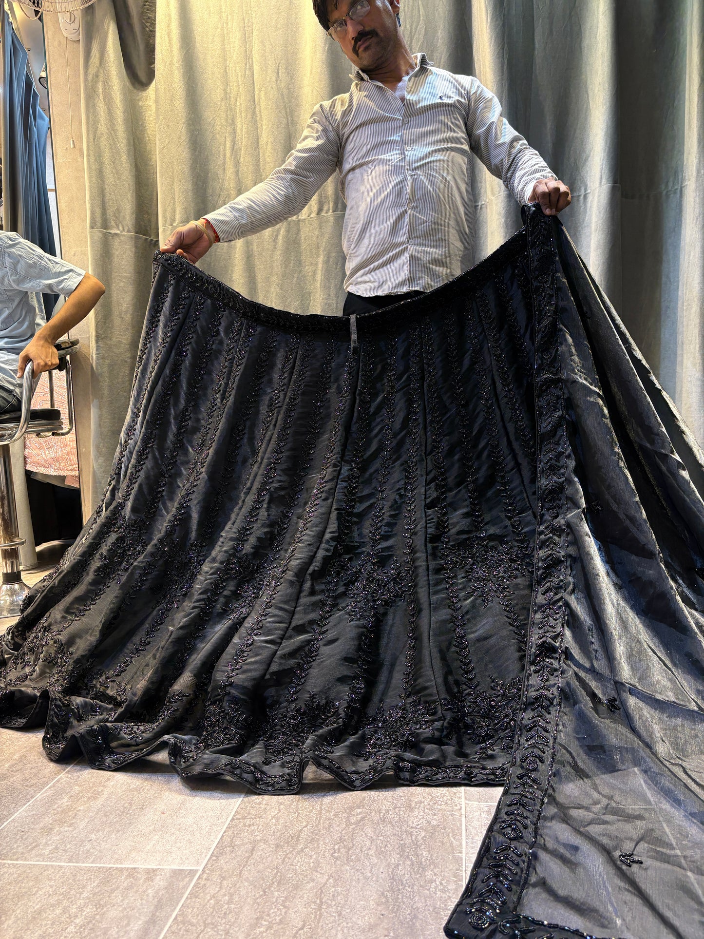 Lavishing black on black monotone handwork Lehenga