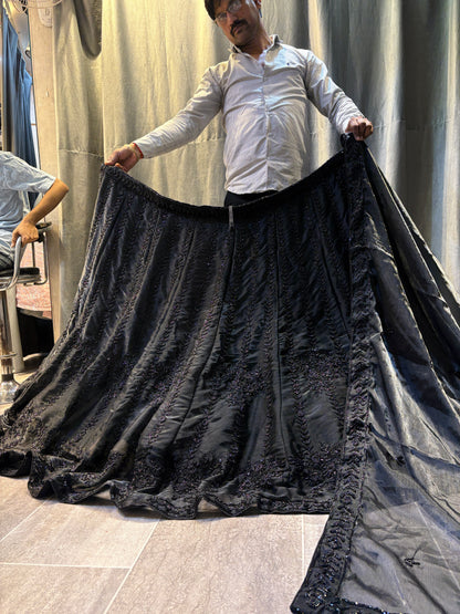 Lavishing black on black monotone handwork Lehenga
