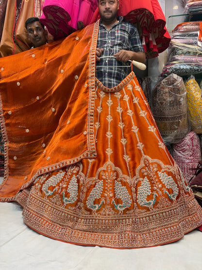 Khoobsurat orange peacock Lehenga