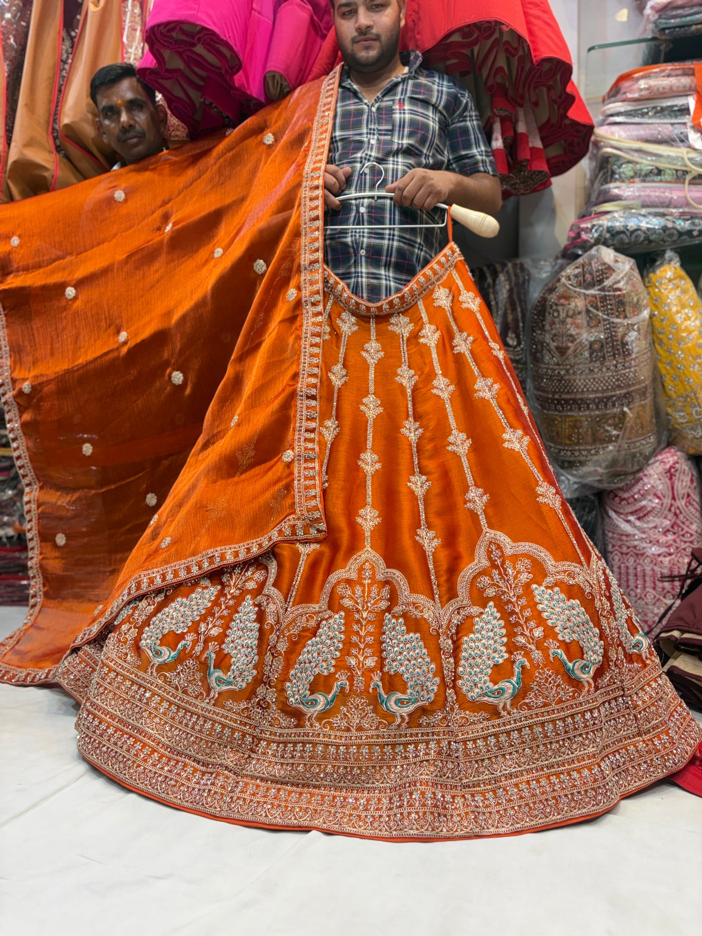 Khoobsurat orange peacock Lehenga