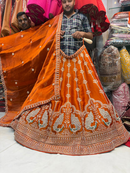 Khoobsurat orange peacock Lehenga