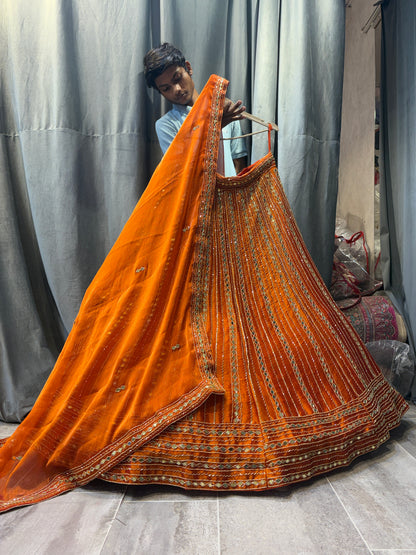 सुंदर ऑरेंज सीक्वेंस लहंगा