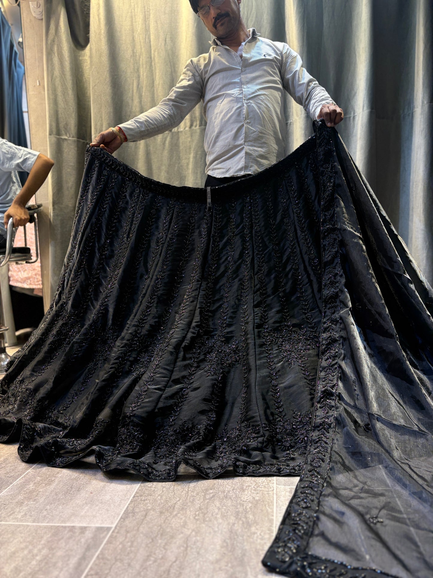 Lavishing black on black monotone handwork Lehenga