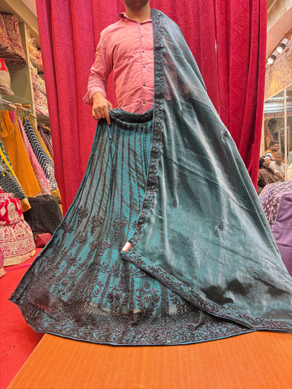 Majestic dark green Lehenga