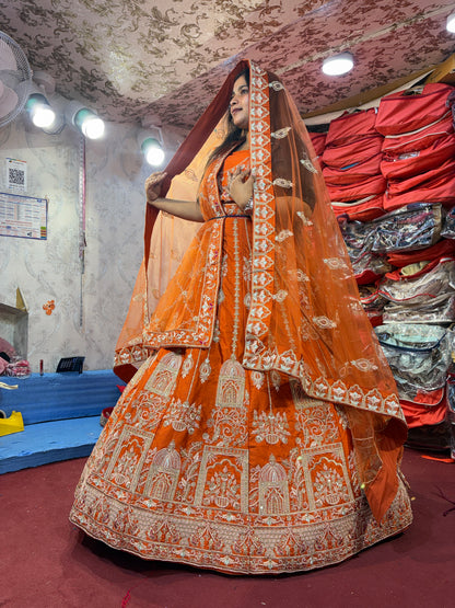 Lovely orange handwork peacock bridal Lehenga