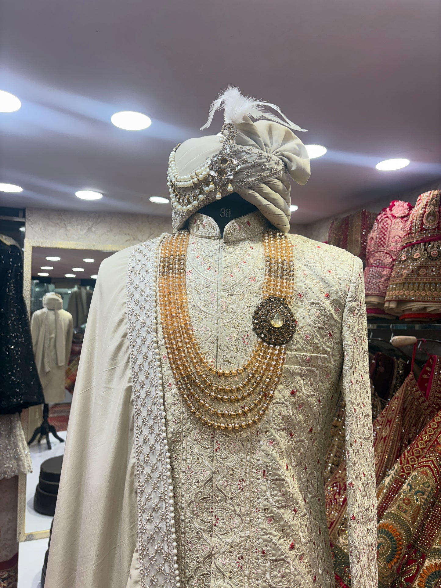 Pretty bridal peacock Lehenga sherwani combo