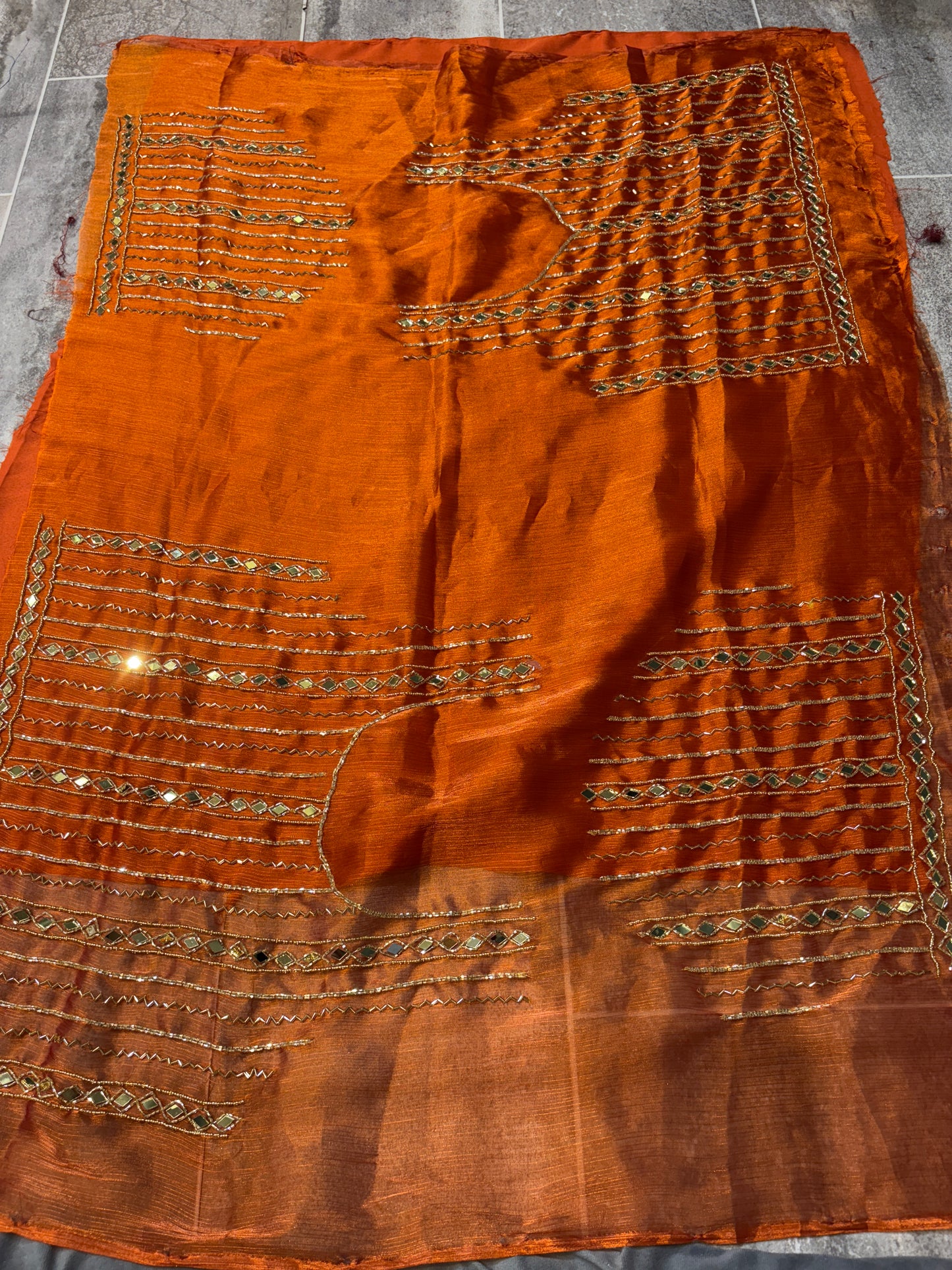 सुंदर ऑरेंज सीक्वेंस लहंगा