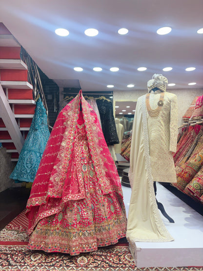 Pretty bridal peacock Lehenga sherwani combo