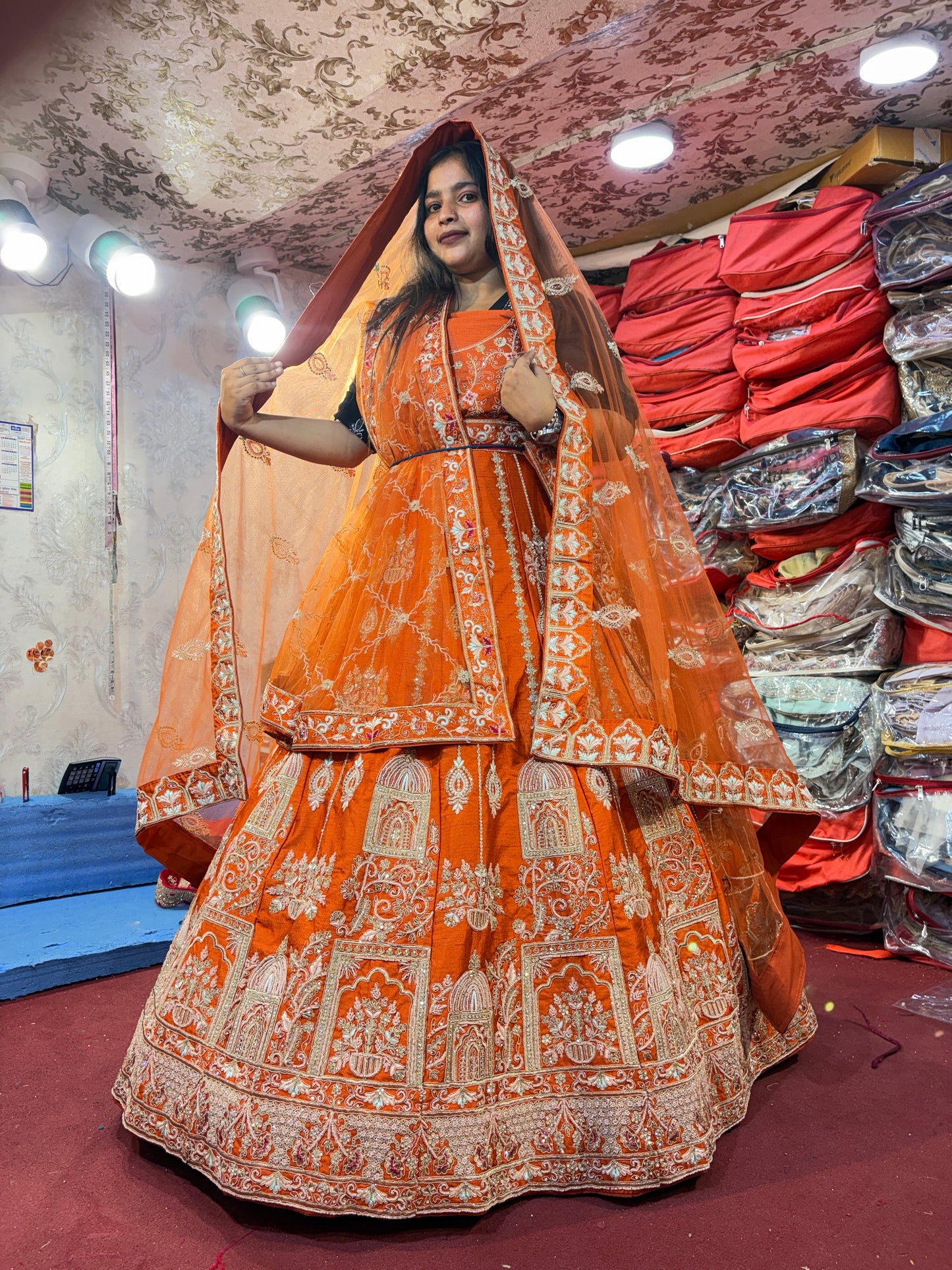 Lovely orange handwork peacock bridal Lehenga