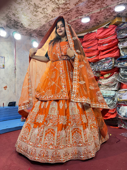 Lovely orange handwork peacock bridal Lehenga