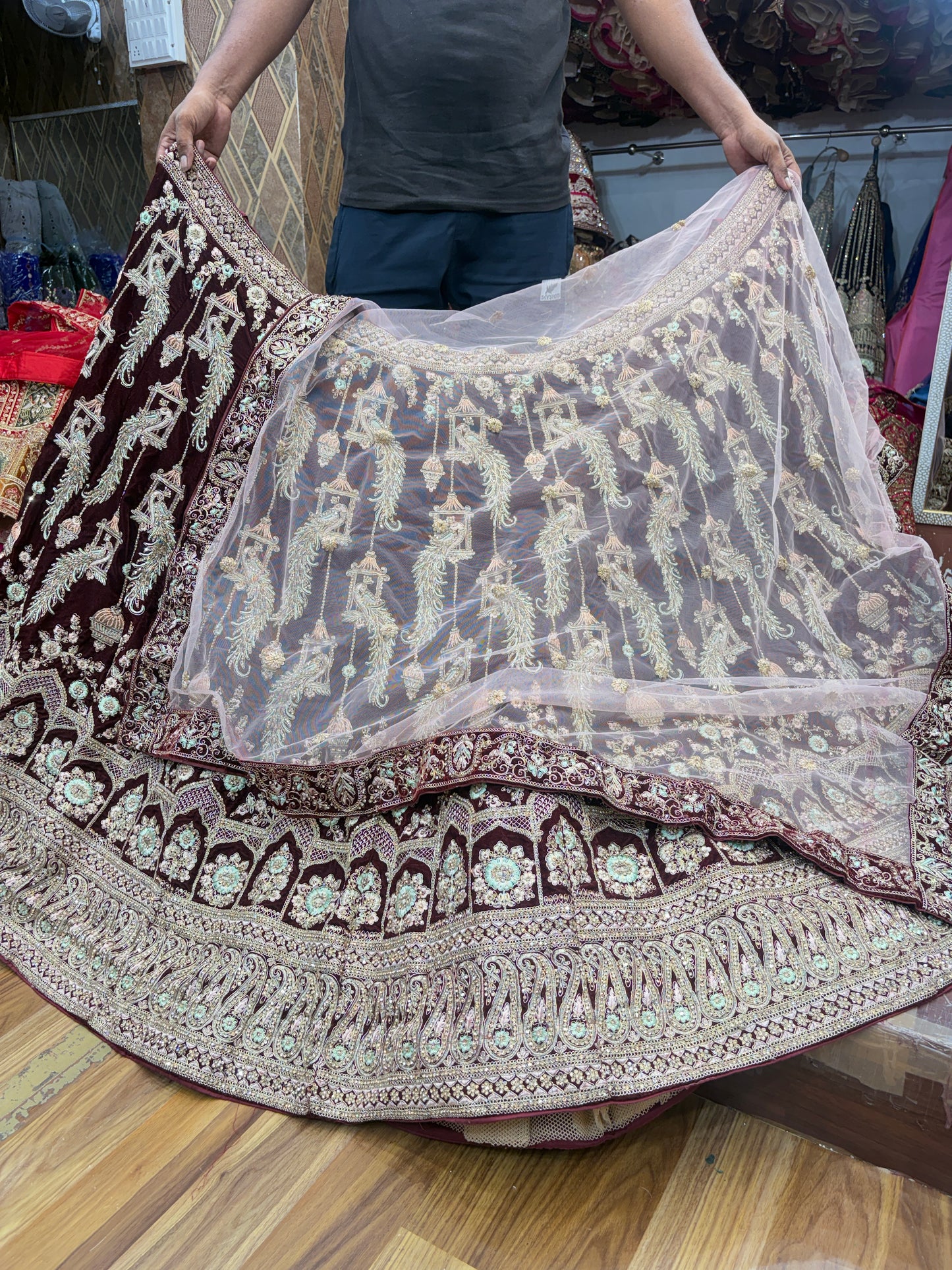 Pleasing maroon peacock bridal Lehenga