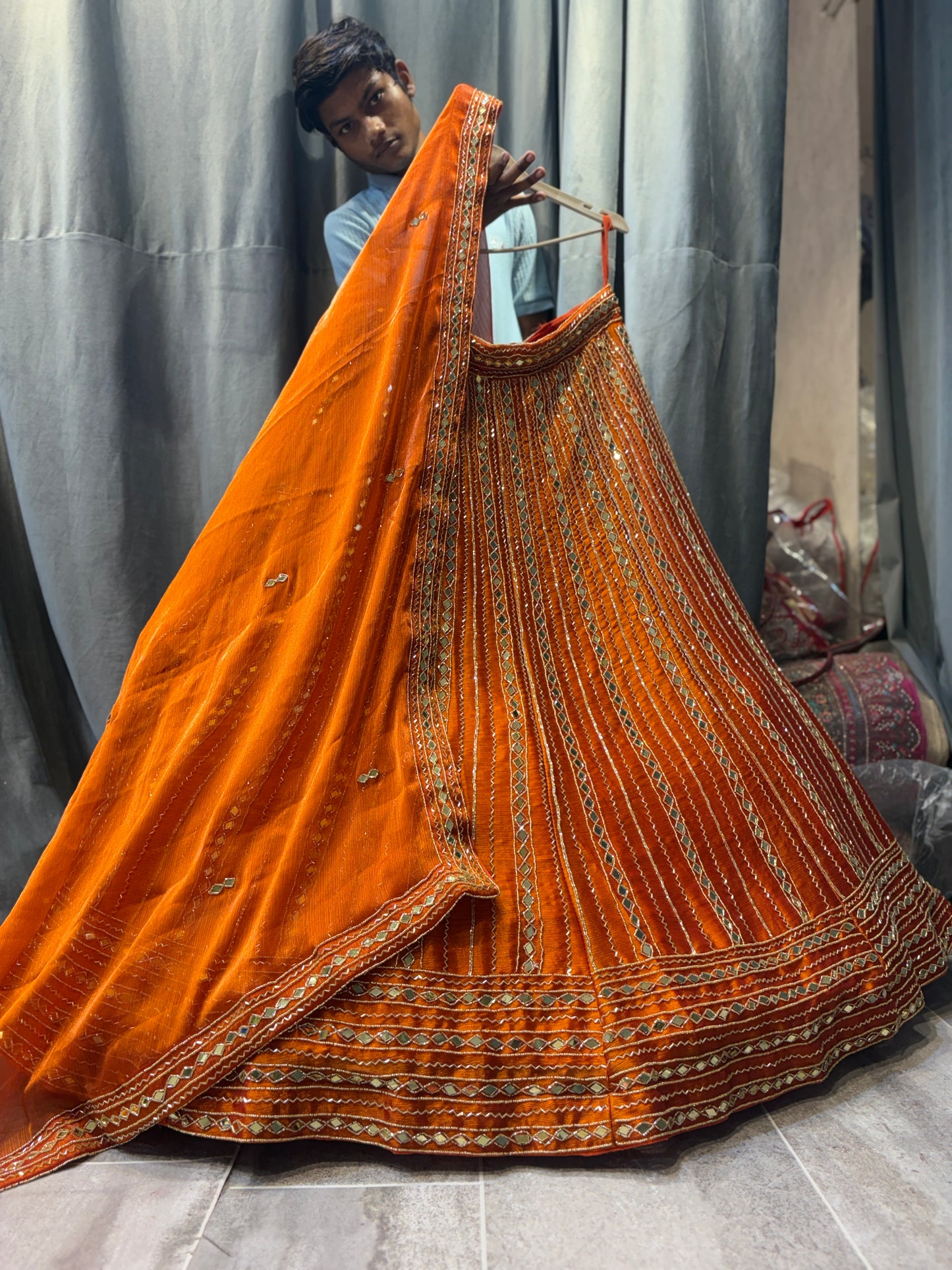 सुंदर ऑरेंज सीक्वेंस लहंगा