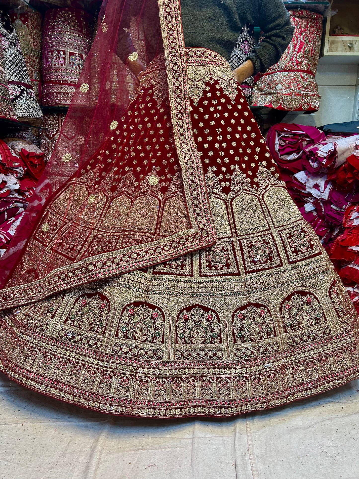 Amazing maroon khidki bridal lehenga