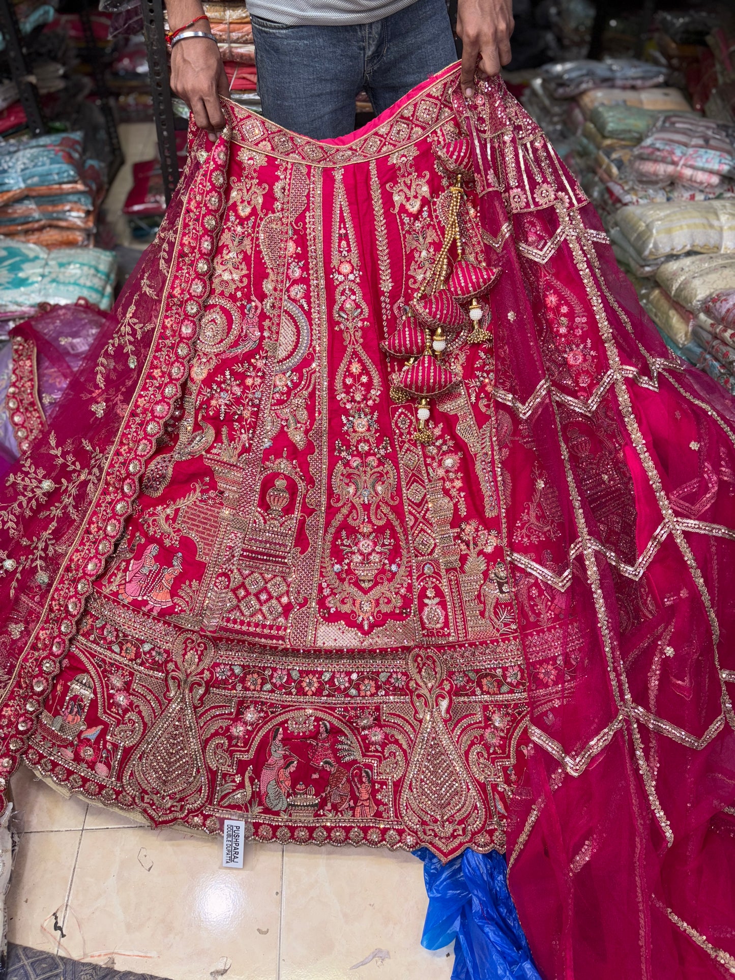 Tremendous Rani pink peacock Jaal Duptta Bridal Lehenga
