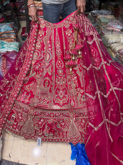 Tremendous Rani pink peacock Jaal Duptta Bridal Lehenga