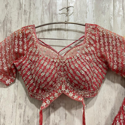 Lavishing orange crop top Lehenga