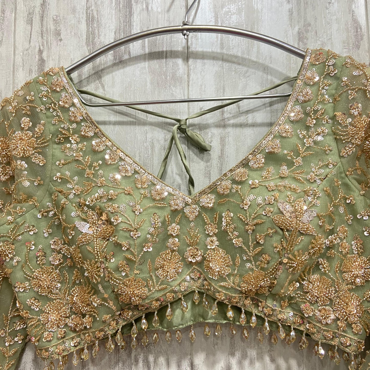 16 kali Heavy work Embellished green peacock crop top Lehenga