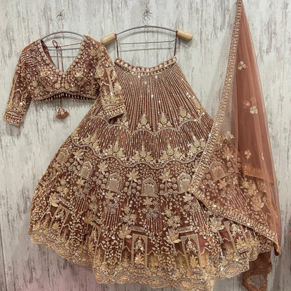 16 kali Heavy work Embellished green peacock crop top Lehenga