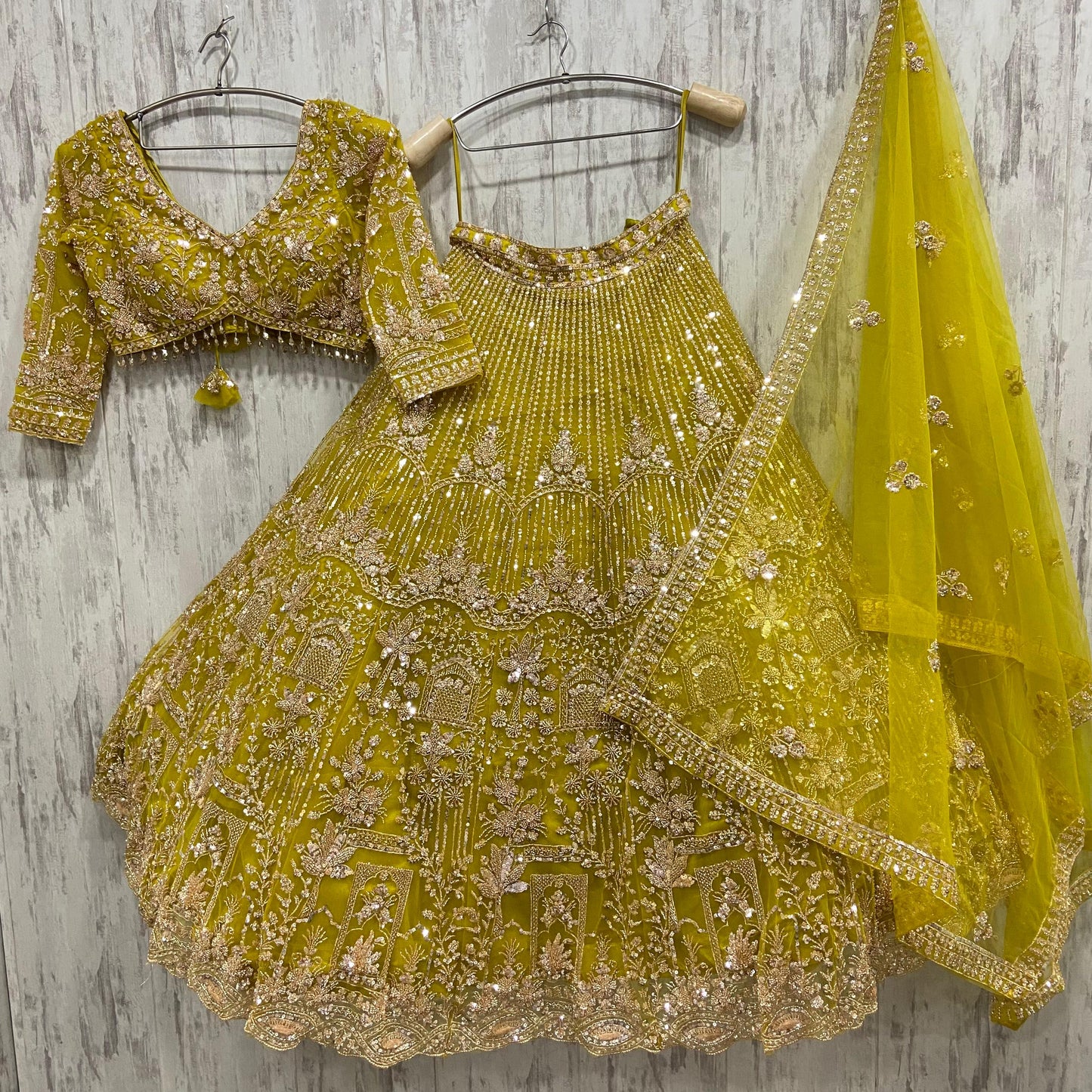 16 kali Heavy work Embellished green peacock crop top Lehenga