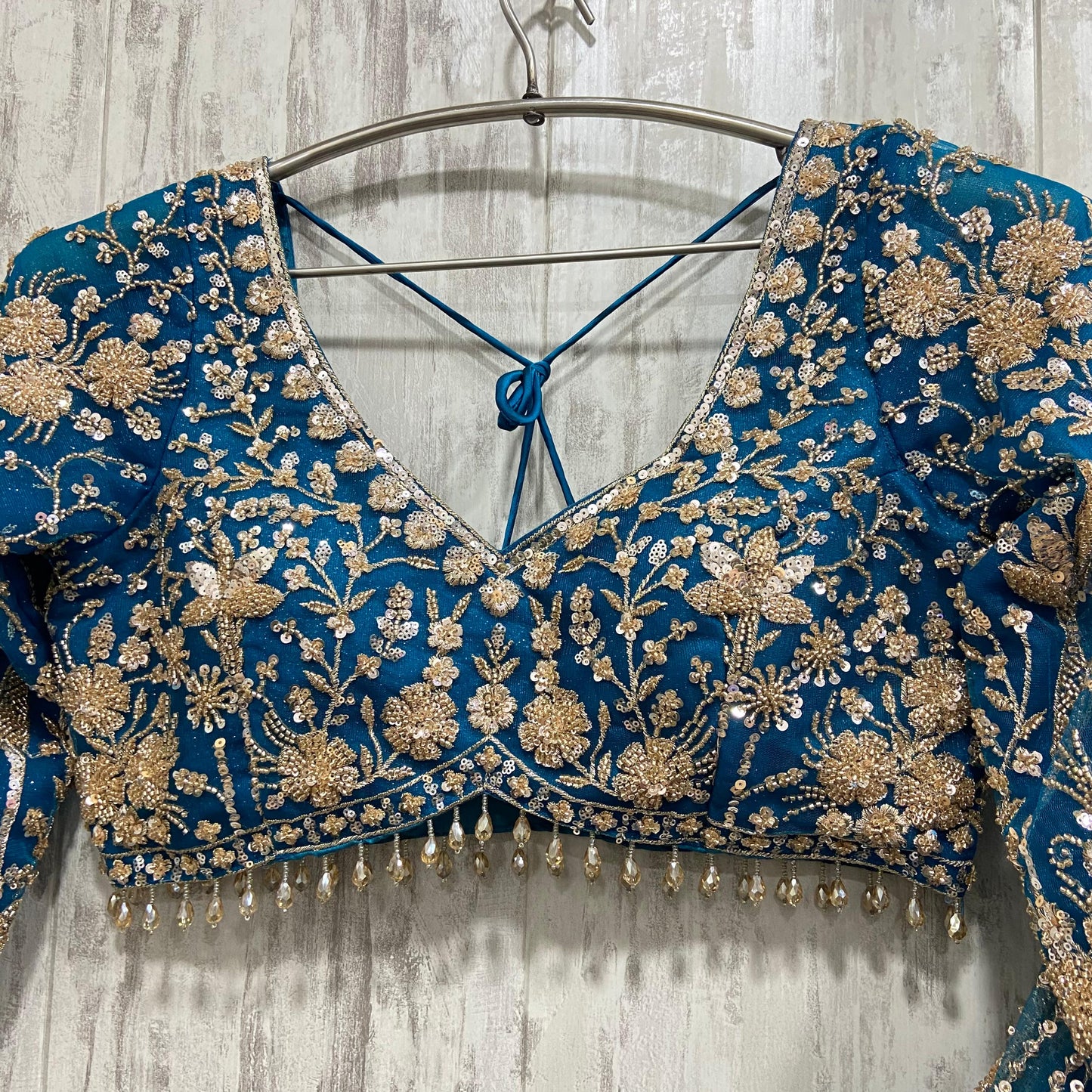 16 kali Heavy work Embellished green peacock crop top Lehenga