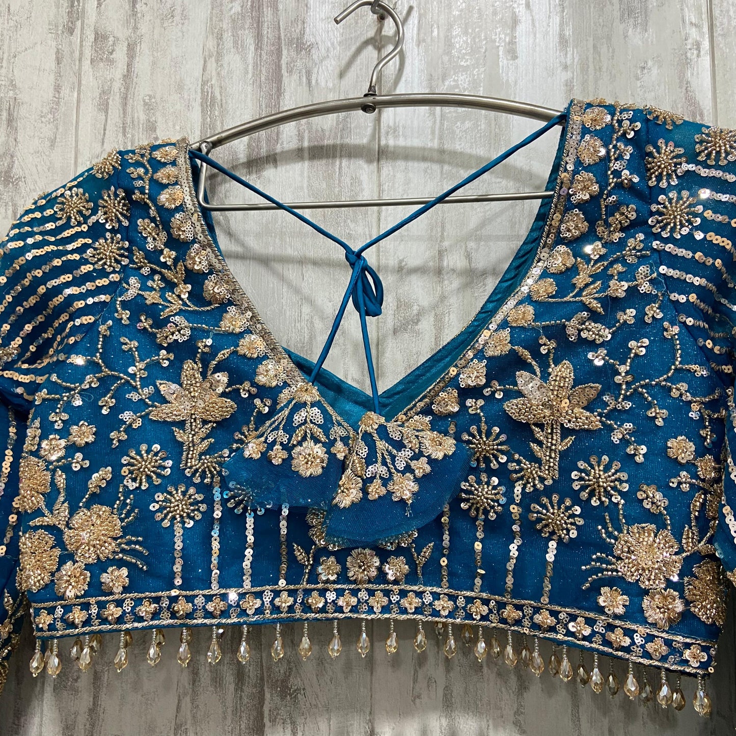 16 kali Heavy work Embellished green peacock crop top Lehenga