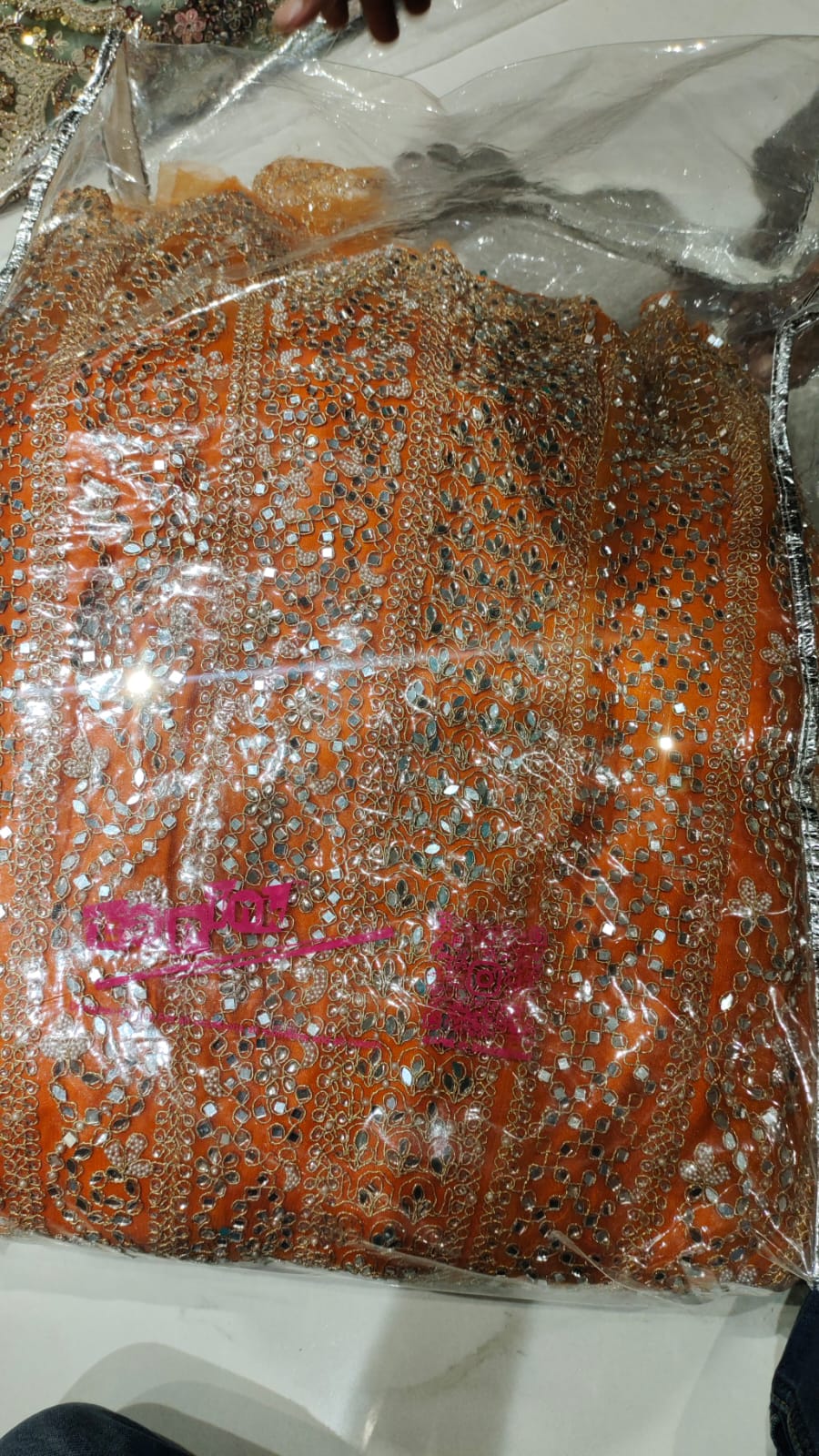 Good looking orange mirror work crop top Lehenga