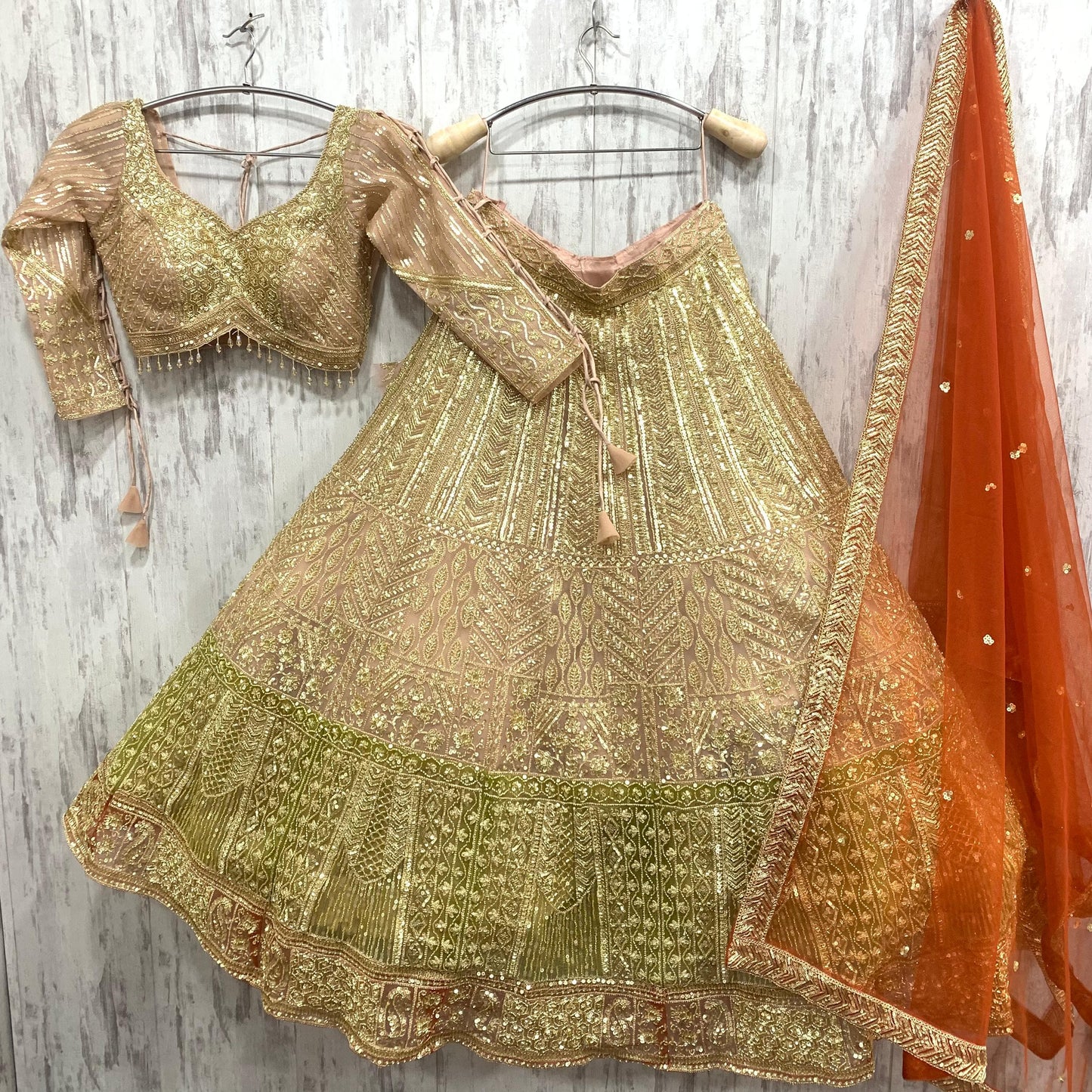 Pretty golden peach green red crop top Lehenga