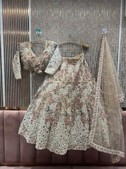 Delightful peach crop top Lehenga peacock