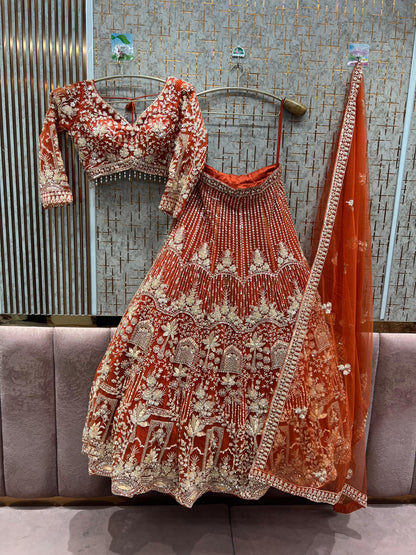 12 kali heavy work Amazing orange crop top Lehenga