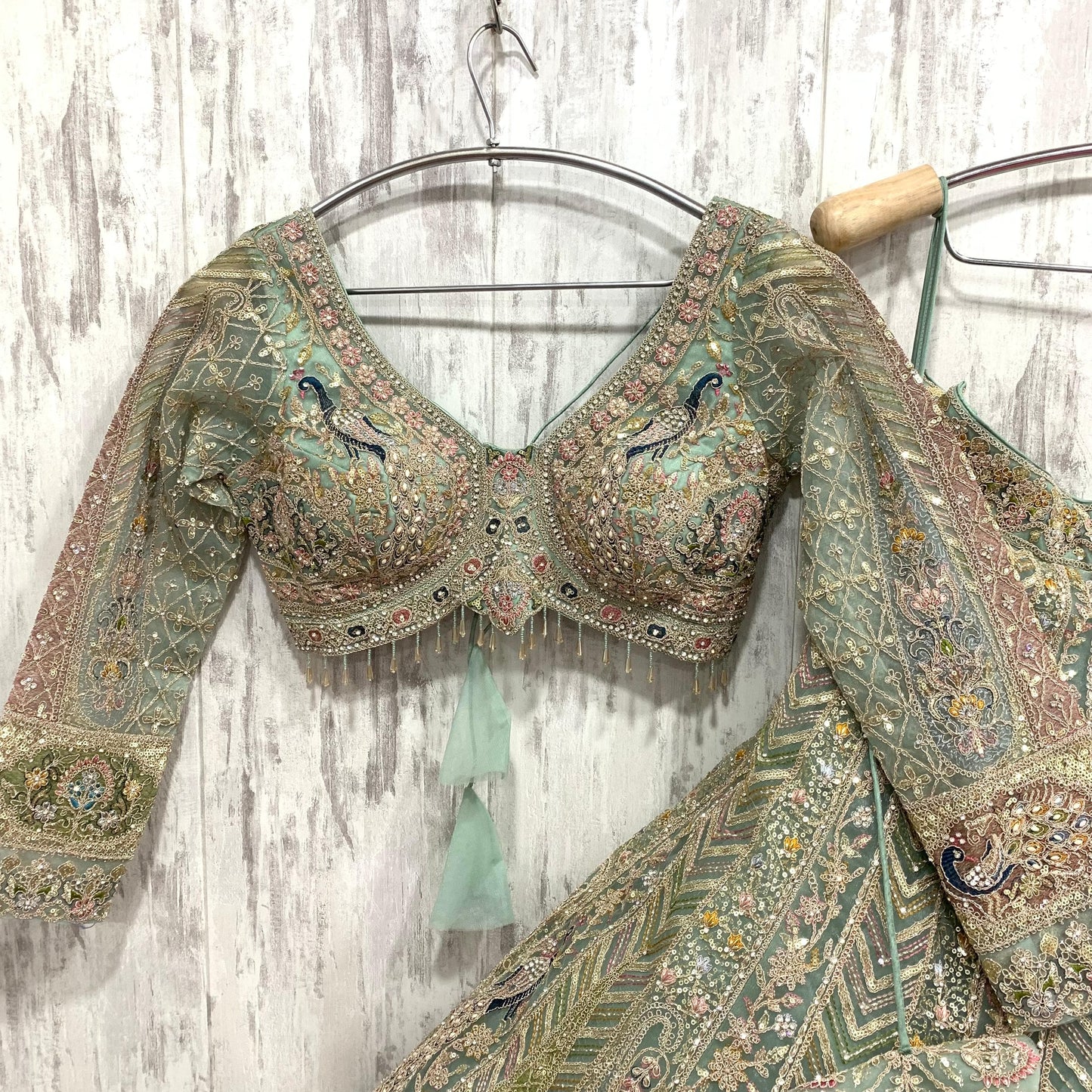 Embellished pista Green peacock crop top Lehenga