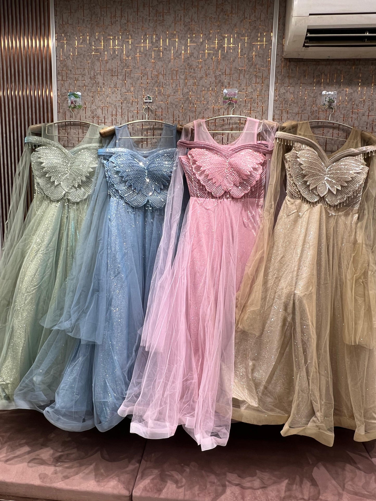 Astonishing green blue pink golden beige gown