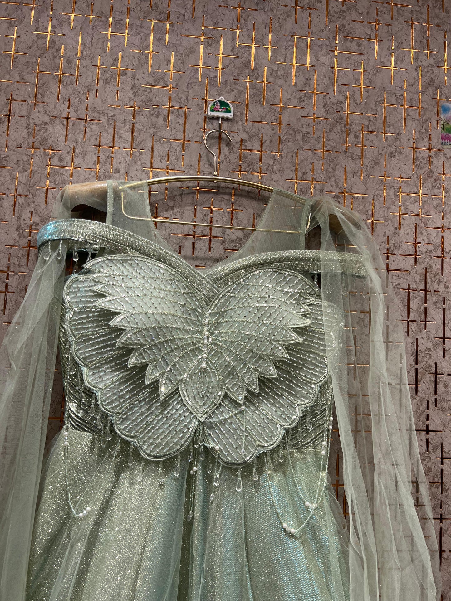 Astonishing green blue pink golden beige gown