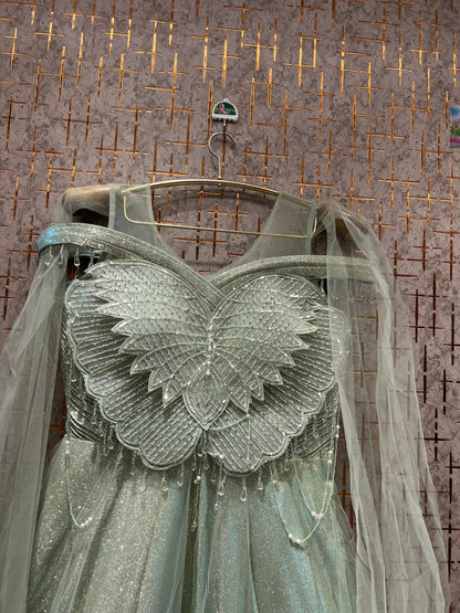 Astonishing green blue pink golden beige gown