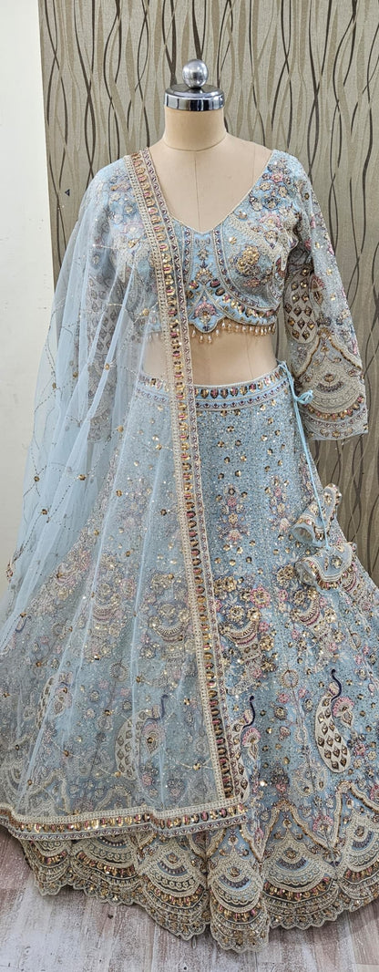 Eye catching light golden chiku brown peacock crop top Lehenga