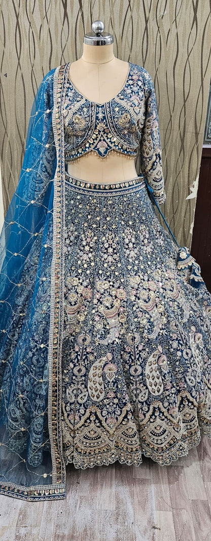 Eye catching light golden chiku brown peacock crop top Lehenga