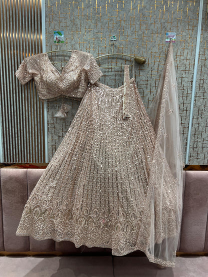 Lavishing peach pink on pink monotone crop top Lehenga