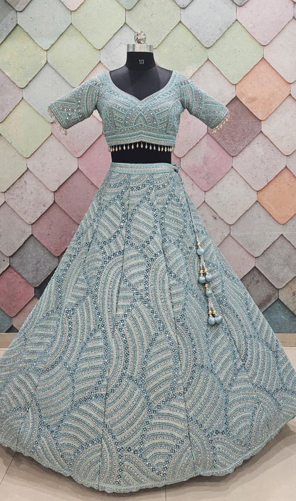 Encantador top corto de lehenga en red con jaal completo en azul cielo y verde mar.