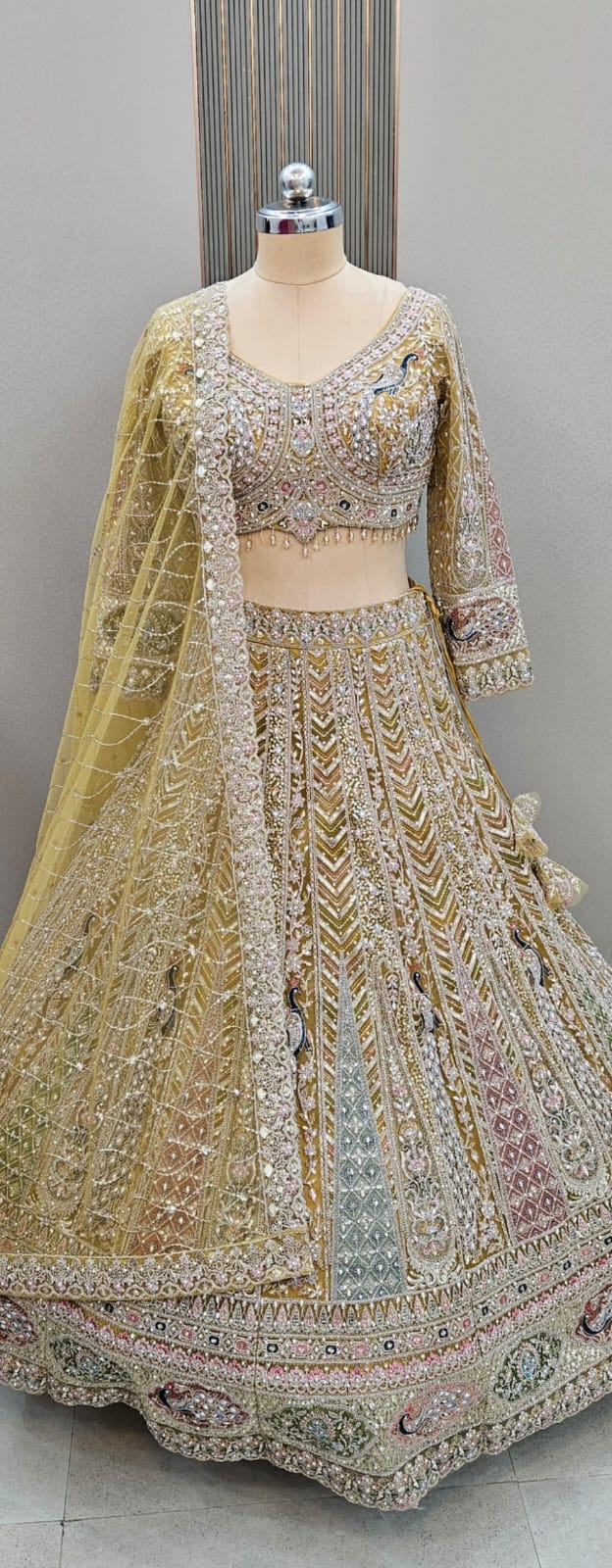 Glamorous yellow golden peacock crop top Lehenga