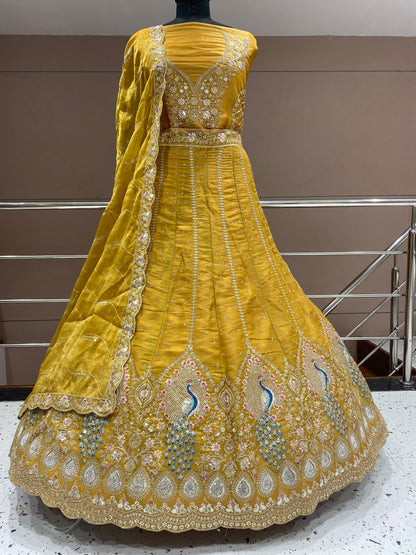 Lovely yellow haldi mehendi peacock Lehenga
