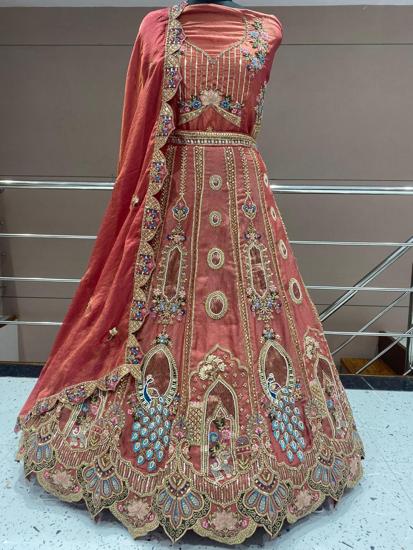 Khoobsurat peach peacock Lehenga