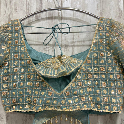 Precioso conjunto de top corto y falda larga color verde mar/azul.