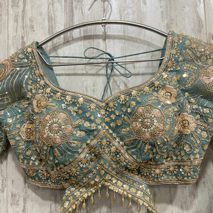 Precioso conjunto de top corto y falda larga color verde mar/azul.