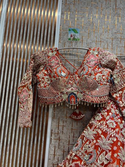 Good looking peacock orange crop top Lehenga