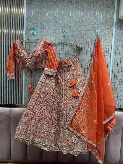 Eye catching orange crop top Lehenga