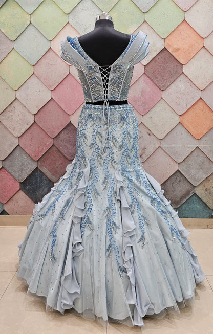 GAURAV GUPTA stunning designer outfit in a beautiful ice-blue shade, crafted with complete hand work on both front and back fish-cut  crop top lehenga