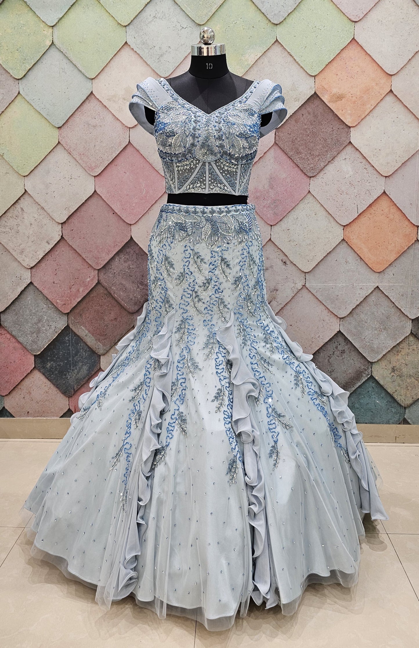 GAURAV GUPTA stunning designer outfit in a beautiful ice-blue shade, crafted with complete hand work on both front and back fish-cut  crop top lehenga